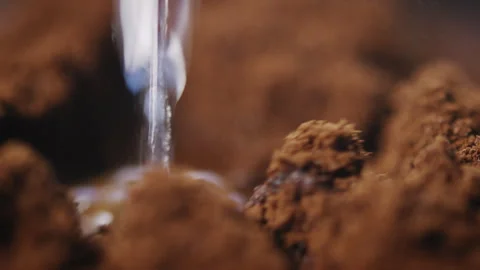 Water poured onto coffee grinds Stock Footage 274685046