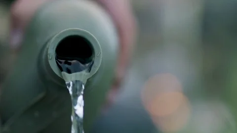 Water pouring from bottle Video stock 77015883