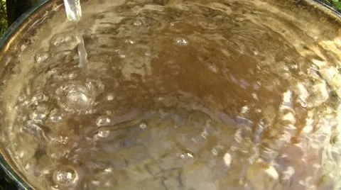 Water pouring to bucket 스톡 동영상 12018175