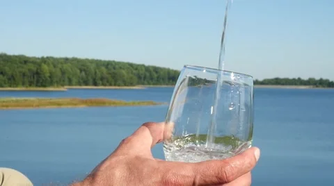 Water Pouring into Cup Stock Footage 54780315