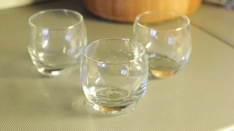 Water pouring into a glass, close up Stock Footage 70742853