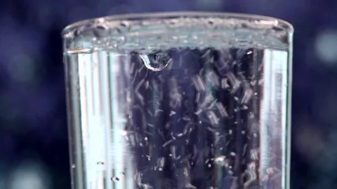 Water Pouring Into Glass Stock Footage 85052984