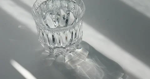 Water Pouring into a Glass on a white Background. Stock Footage 281115853