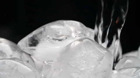 Water pouring on ice Stock Footage 196181240