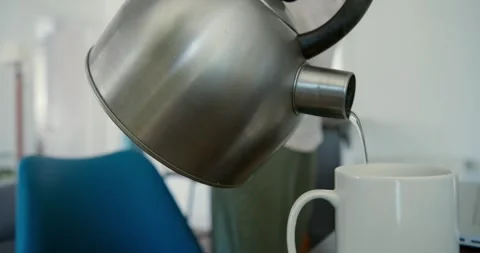 Water Pouring into Mug Stock Footage 334651942
