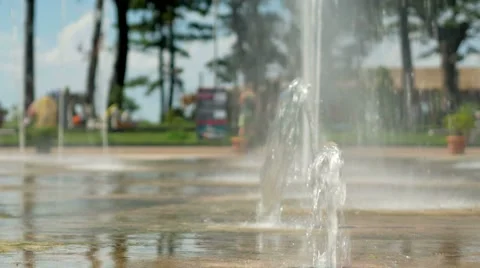 Water pouring out of the ground. The flow of water falls to the ground Stock Footage 67615411