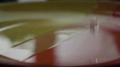 Water pouring on plastic orange surface Stock Footage 76430429