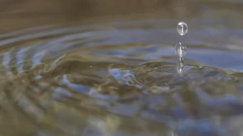 Water pouring into a pond Stock Footage 102885848