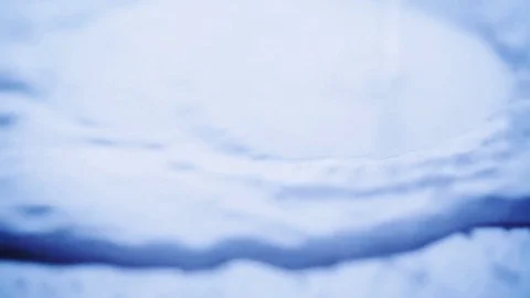 Water pouring on white surface Stock Footage 81268064