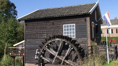 Water powered corn mill in operation water wheel turning Stock Footage 73241507