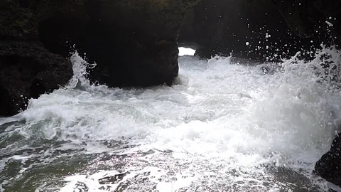 Water pressing between rocks Stock Footage 104739150