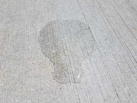 Water puddle on cement Stock Photos
