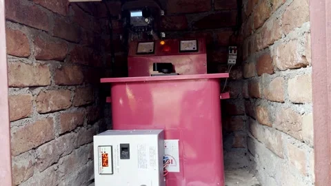 Water Pump Motor and Stabilizer Installed for Borewell Water Stockbeeldmateriaal 339778575