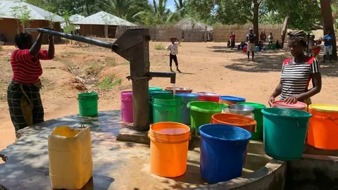 Water pump in Mozambique Stock Footage 122660892