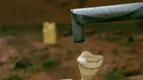 Water pump tap dripping Uganda Africa Stock Footage 170866557