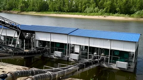 Water pumping station on the river Video stock 254908650