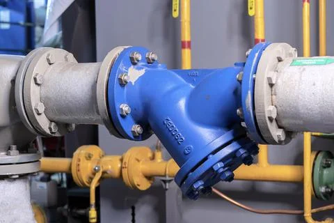 Water purification filter and mud collector in the gas boiler house. Stock Photos
