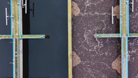 Water purification process in a treatment facility during daytime Stock Footage 337392148