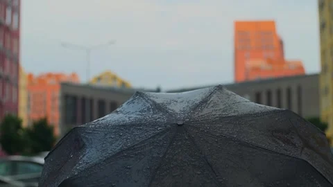 Water rain drops falling on open umbrella. Slow motion drop of water droplets on Stock Footage 251735851