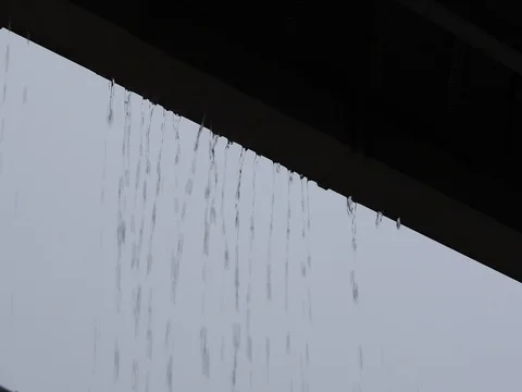 Water rain drops overflow on gutter roof house, rainy day weather scene Stock Footage 80921867