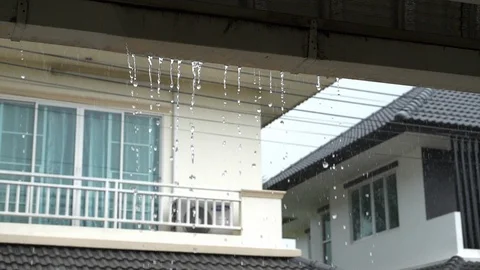 Water rain drops overflow on gutter roof house Stock Footage 92413481