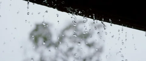 Water raindrops off of a gutter or side. slomo cu A Stock Footage 111676875