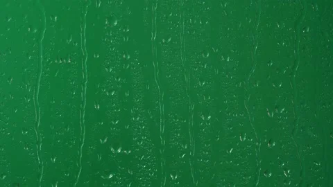 Water rainfall, rain drops falling on window glass over chroma key green screen Stock-Footage 175101954