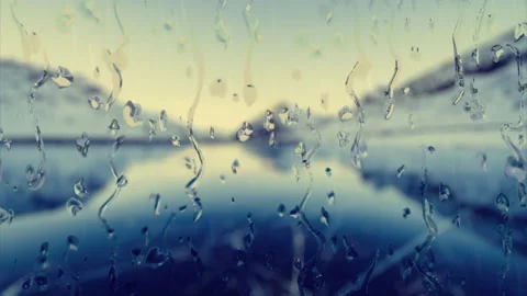 Water rainfall, rain drops falling on window glass over cold background. Stock-Footage 321533575