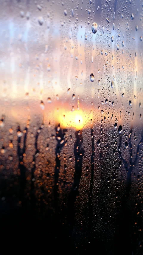 Water raining Drops Flowing on window Glass Stock Footage 284734205