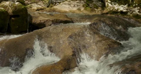 Water rapids slow motion on rocky sunny stream Stock Footage 341901284