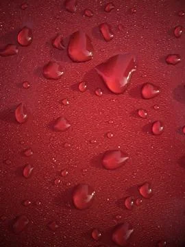Water on red surface Stock Photos