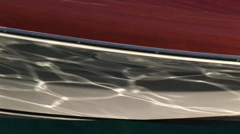 Water reflecting on a bow Stock Footage 32042918