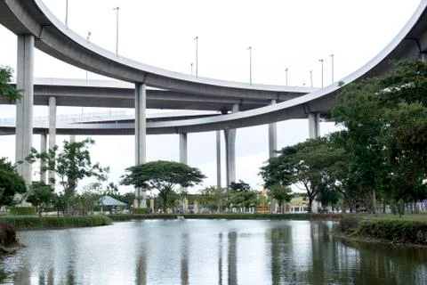 Water reflection bridge structure with lake park Stock Photos
