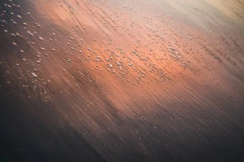 Water reflections on a beach Stock Photos