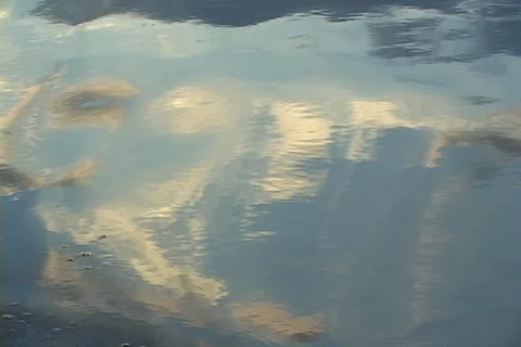 Water reflelctions- smooth surface undulates Video stock 125720169