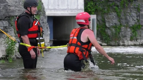 Water rescue swimming after practice vitcim 4k slow motion action Stock Footage 78077611
