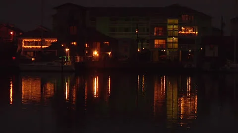 Water residence with light reflection 2ext, night Stock Footage