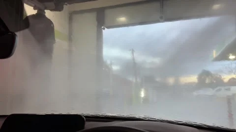 Water Rinsing Off Windshield Inside Automatic Car Wash from Driver's Perspe.. Stock-Footage 340680590