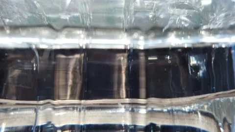Water ripple in the bottle  Stock Footage 225891016