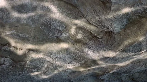 Water ripple caustic light reflections on stone wall Stock Footage 74297540