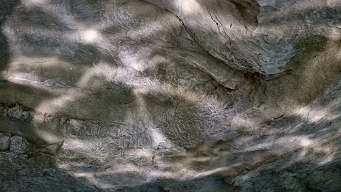 Water ripple caustic light reflections on stone wall Stock Footage 74298897