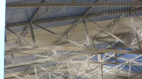 Water ripple caustic light reflections on metal construction  스톡 동영상 99820914