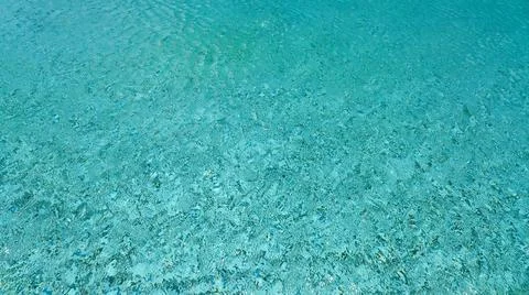 Water ripple pattern in pool on sunny day Stock Photos