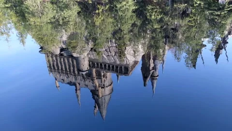 Water ripple reflection of Hogwarts Castle Universal Studios Japan Stock Footage 133214439