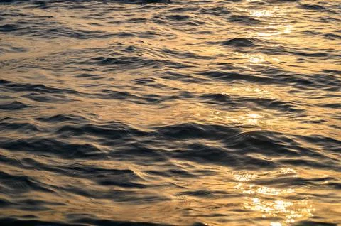 Water ripple wave patterns with reflections Fotos Stock