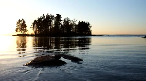 Water ripples at sunset Stock Footage 59975982