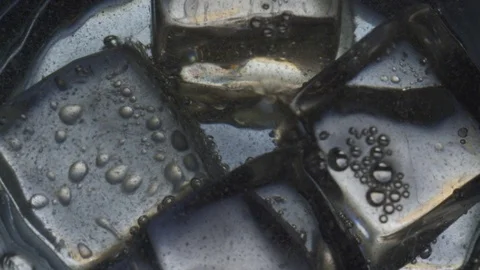 Water Rippling Over Ice Cubes Background Stock Footage 76422537