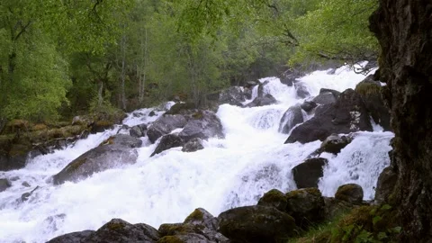 Water in river of Feigefossen waterfall Stock Footage 230171579