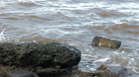 Water of river flows through stones Stock Footage 39348970