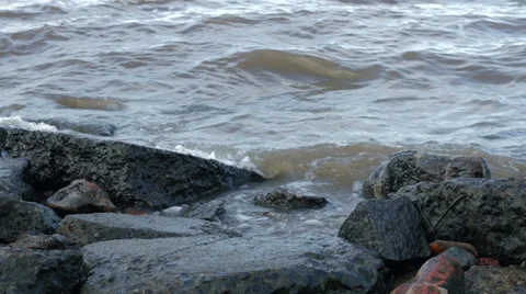 Water of river flows through stones Stock Footage 39350017